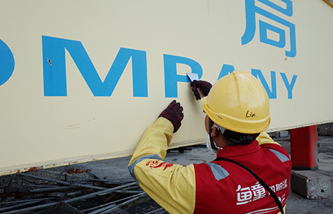 UTOP specialist inspecting a coated marine structure