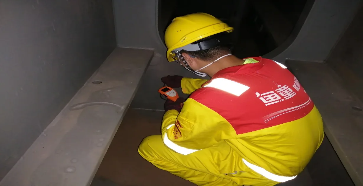 UTOP technician checking a coated steel structure
